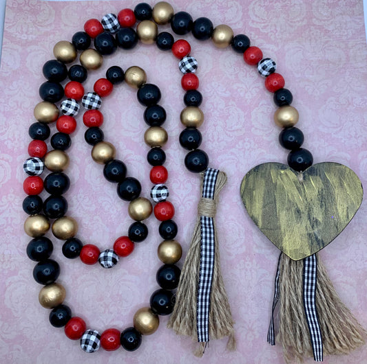 Red, Black, Gold & Buffalo Check Wooden Bead Garland w/ Large Gold & Black Heart and Tassels